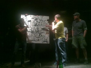 Dražba grafiky vytvořené na náměty diváků během představení